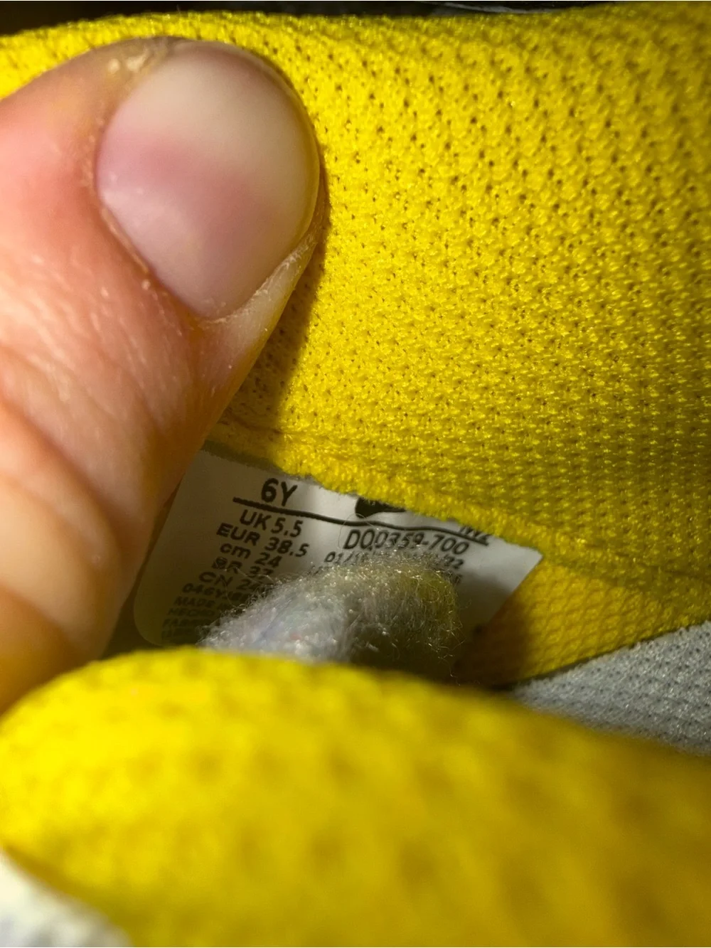 Nike Yellow & White Low-Top Sneakers with Black Swoosh Outline